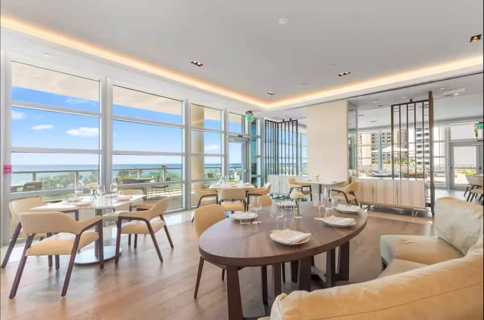 A resort restaurant dining room beside the windows