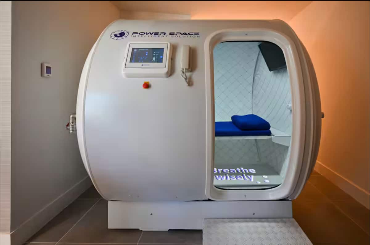 Hyperbaric oxygen therapy chamber in a treatment suite