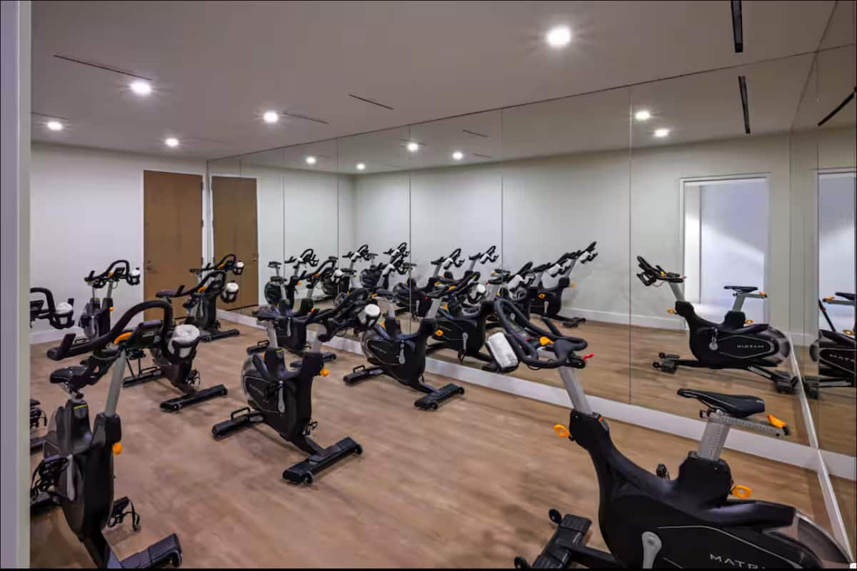 The cycling studio with rows of stationary bikes