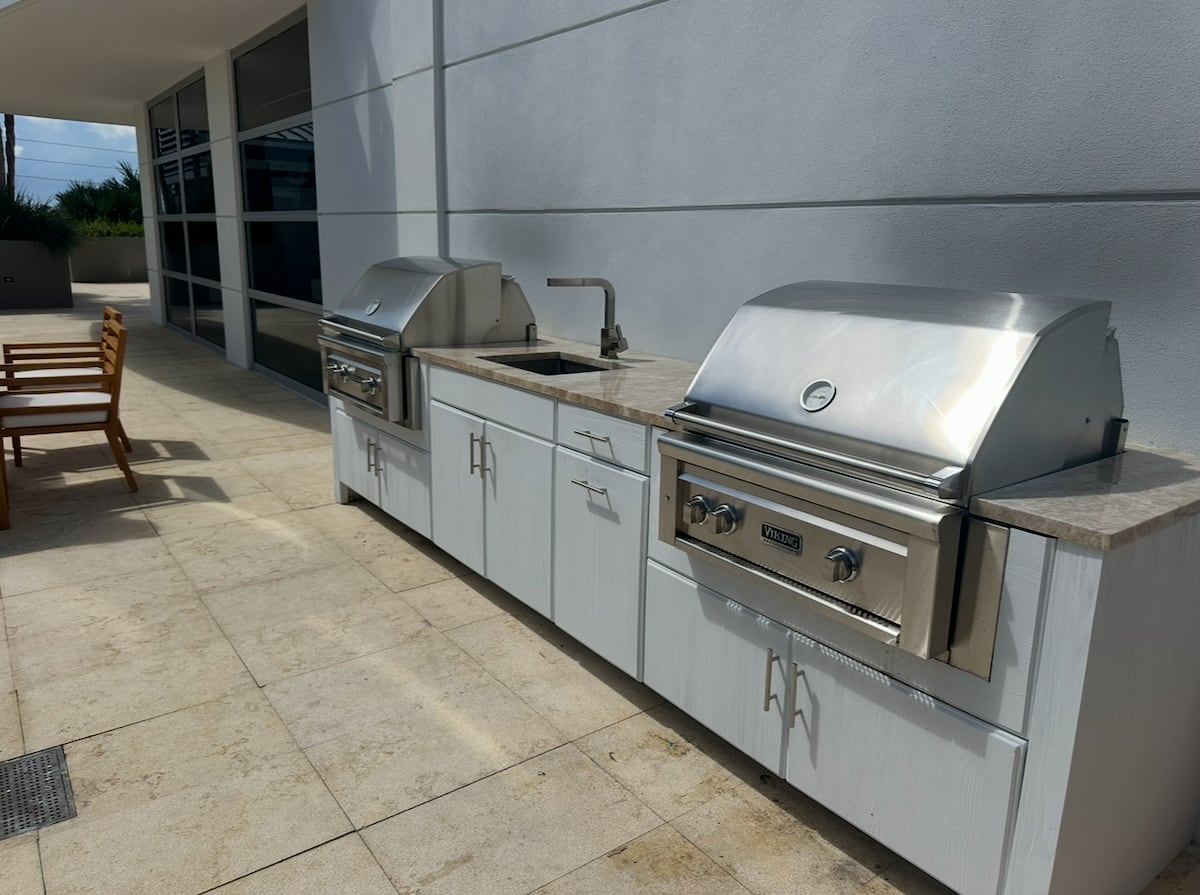 The outdoor kitchen and grill on the social terrace