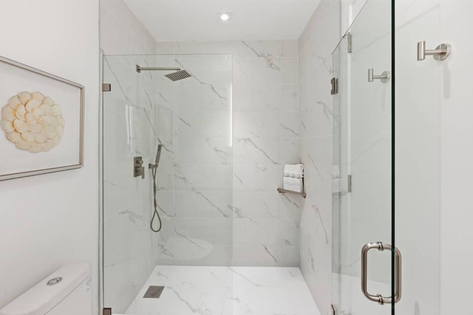 Marble walk-in rain shower in the second ensuite