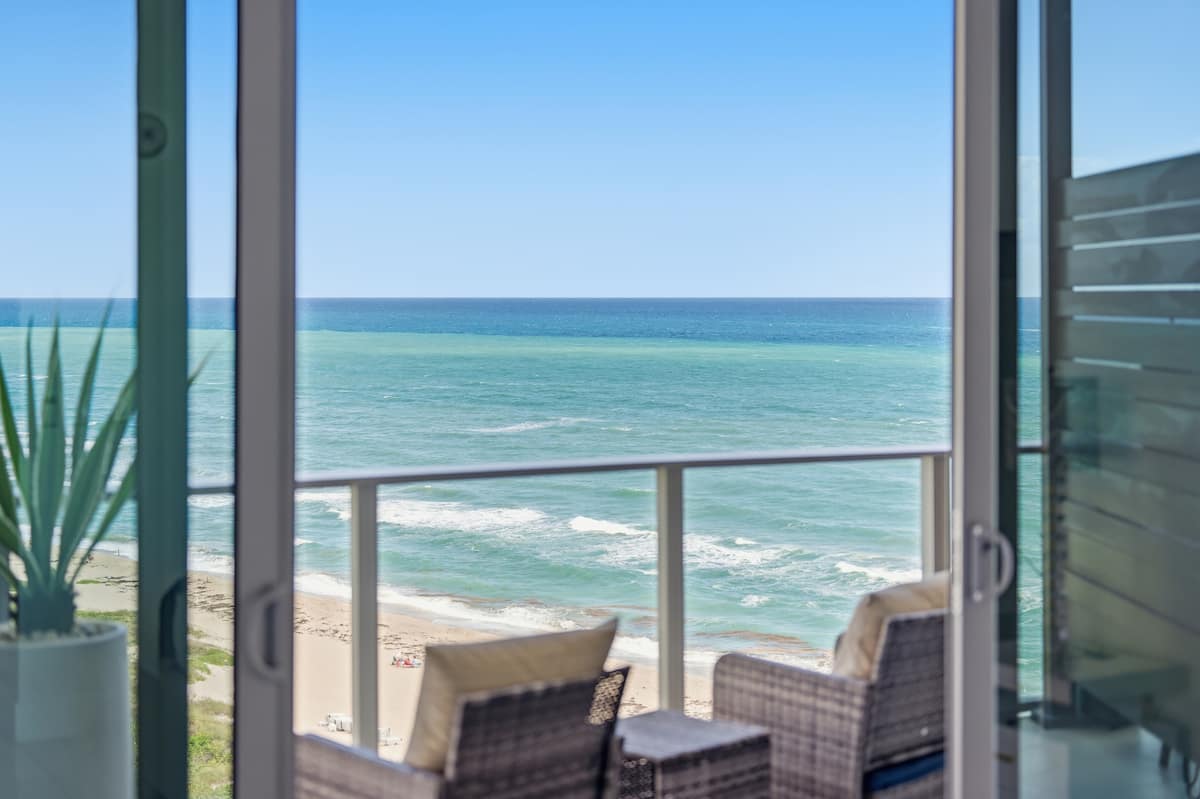 Balcony lounge seating facing the ocean